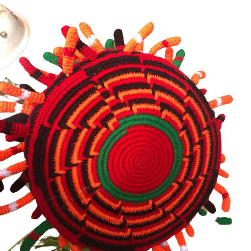 Woven ceremonial cap with coloured tufts — North West Elites e.V.